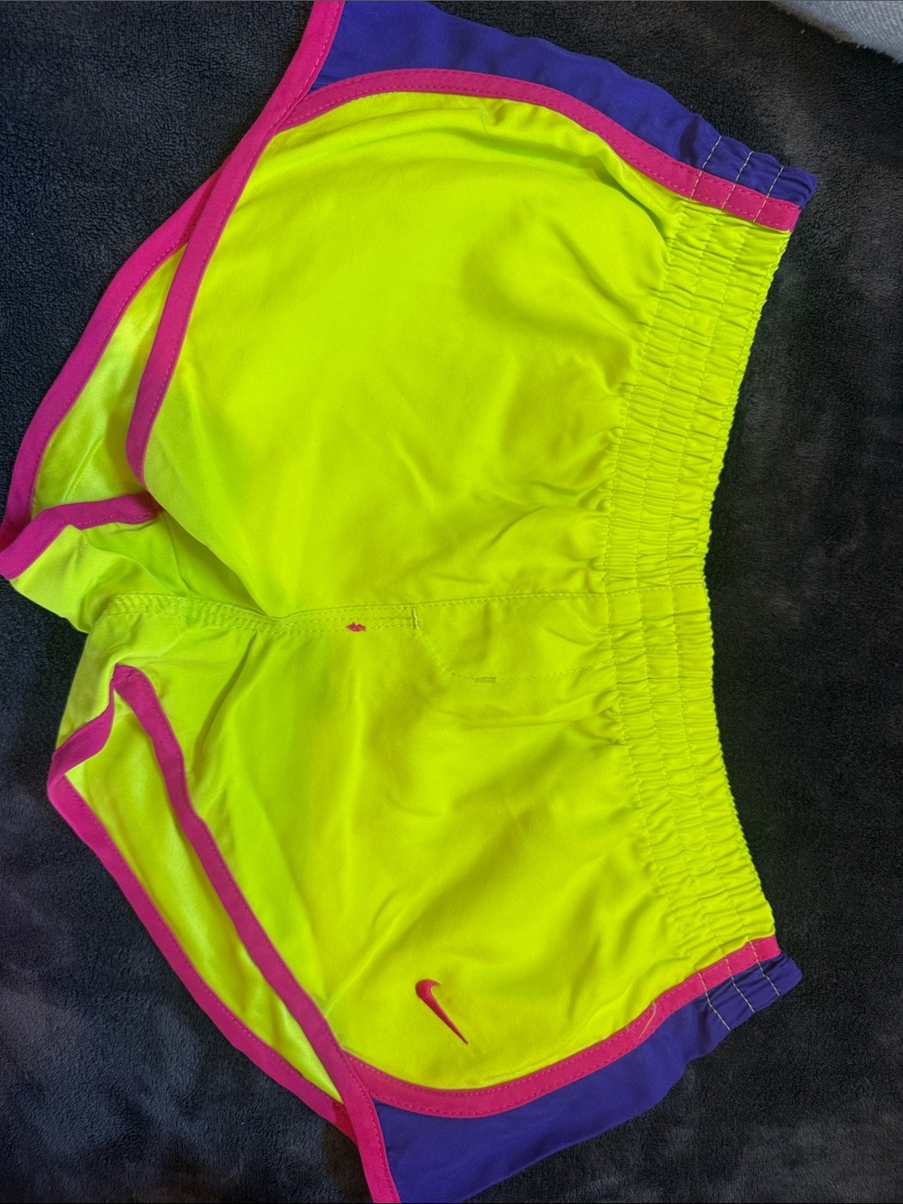Nike Kid’s Neon Yellow Running Shorts with Pink Trim and Purple Accents